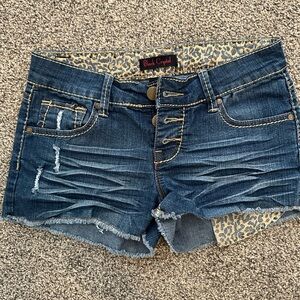 Jean shorts with leopard print detail
